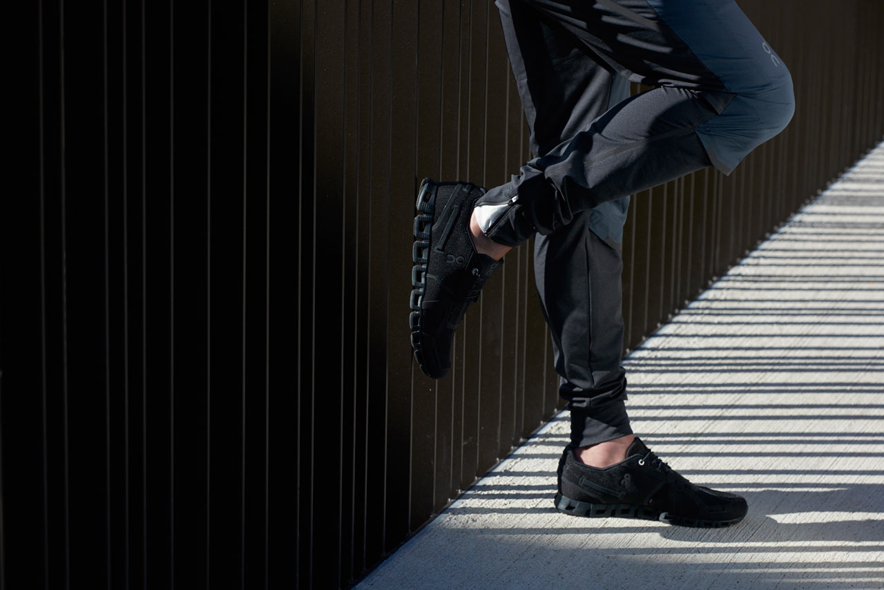Illustrative example of all black running shoes