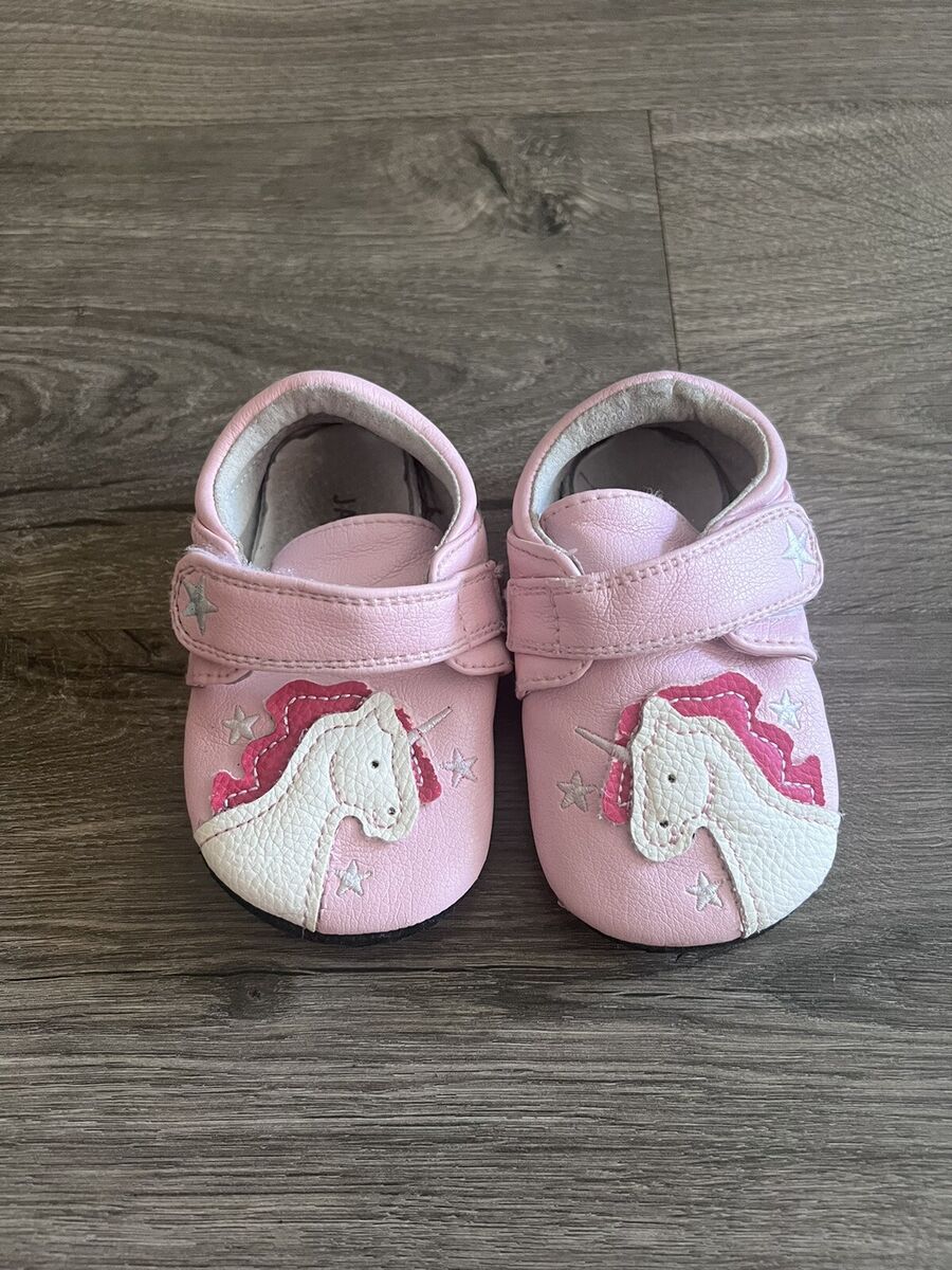 Illustrative example of baby shoes girl