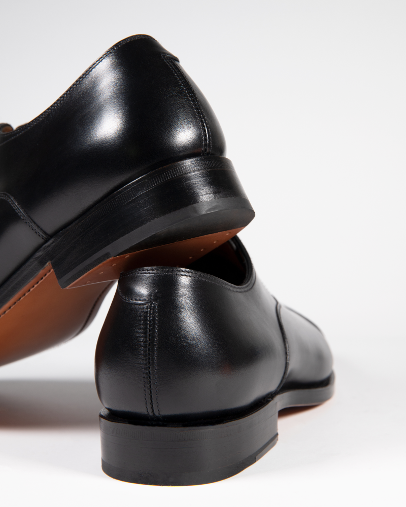 Illustrative example of black oxford shoes