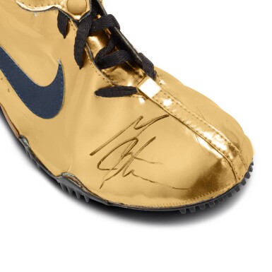 Illustrative example of gold nike shoes