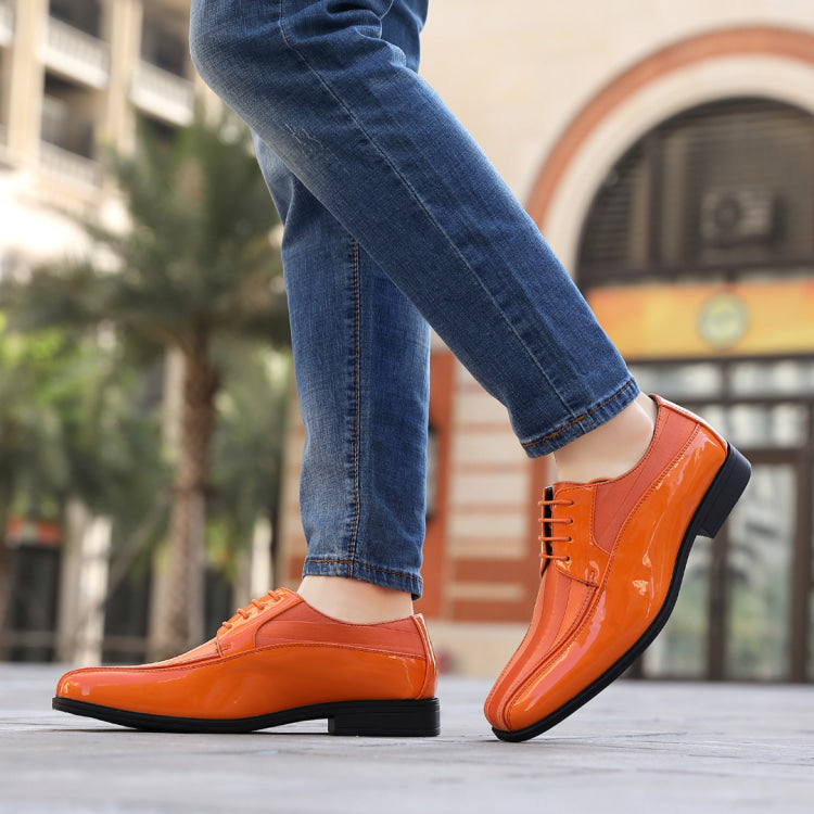 Illustrative example of orange colour shoes for men