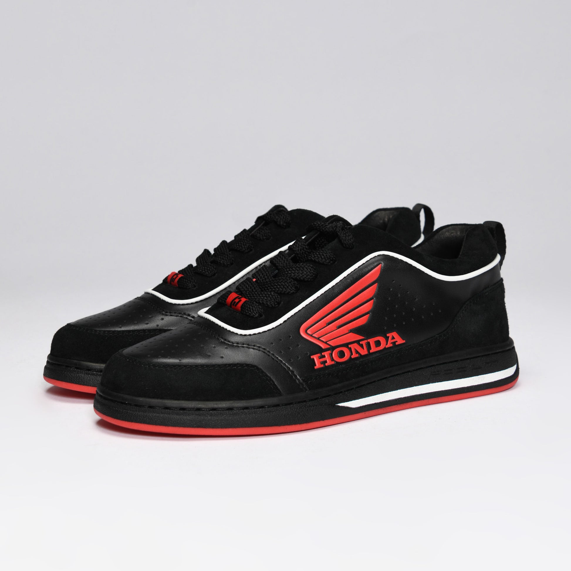 Illustrative example of red and black shoes