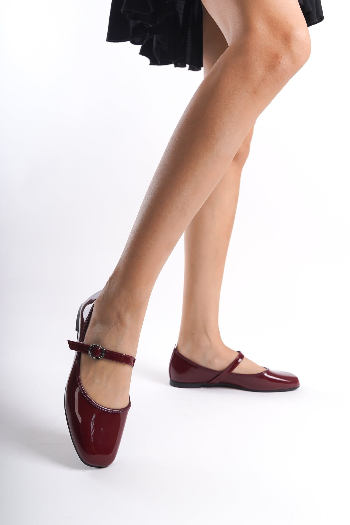 Illustrative example of red mary jane shoes