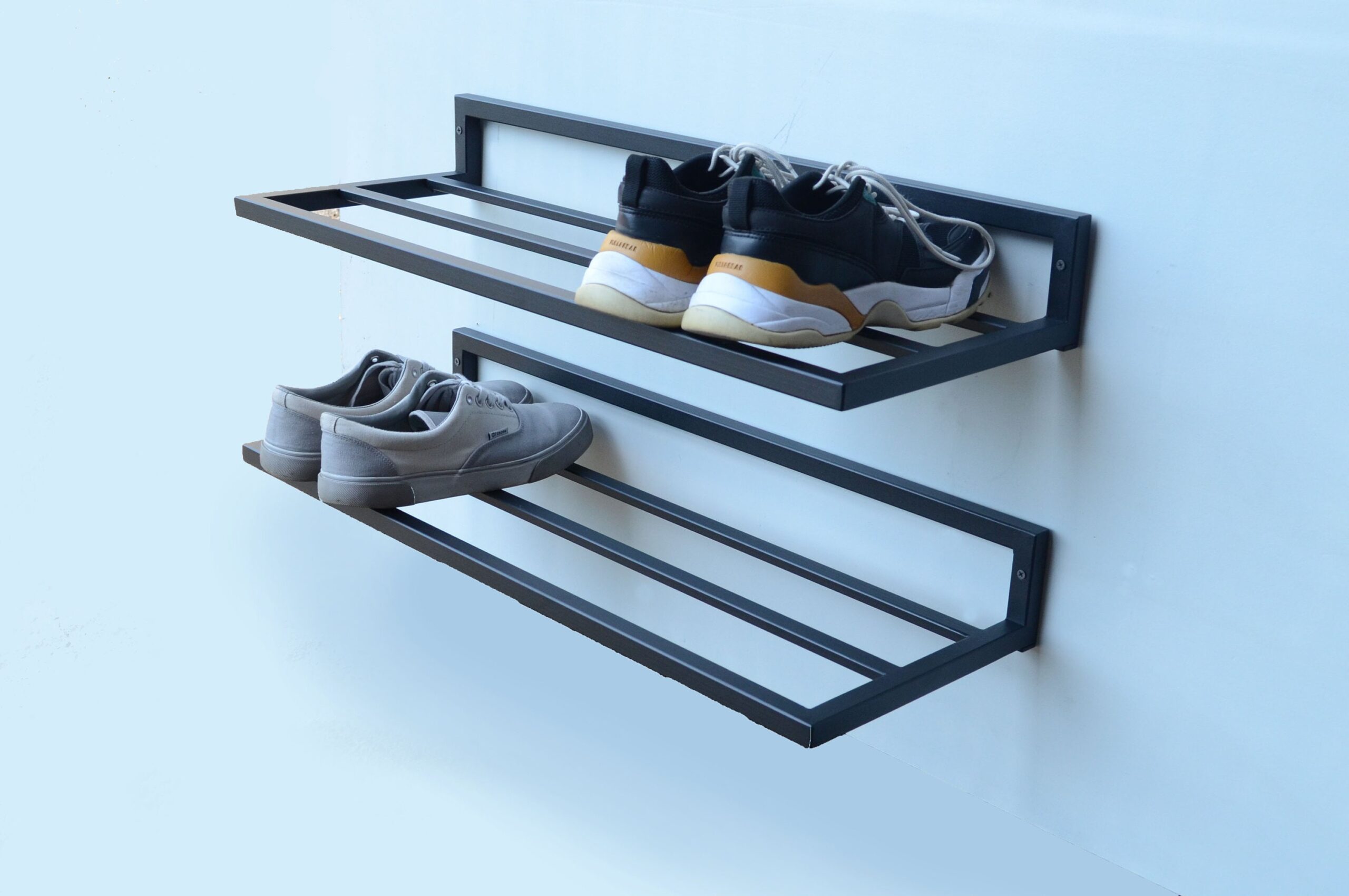 Illustrative example of wall mounted shoe rack