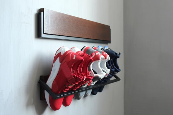 Illustrative example of wall mounted shoe rack