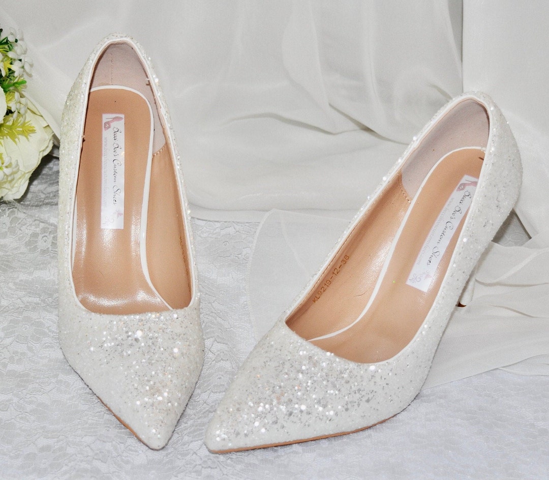 Illustrative example of white bridal shoes