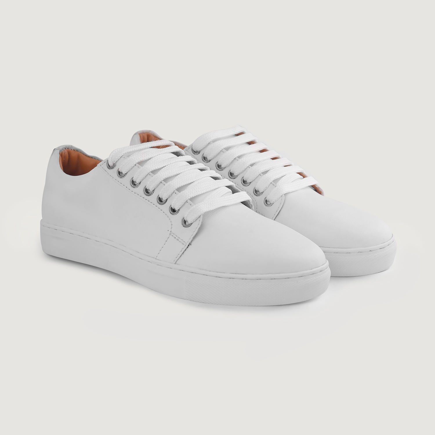 Illustrative example of white leather shoes