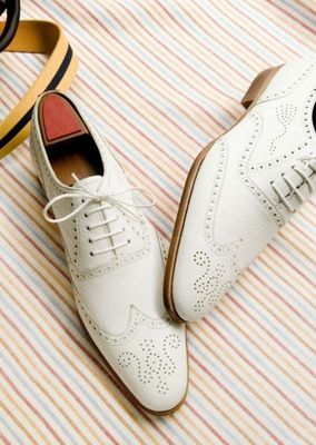 Illustrative example of white leather shoes mens