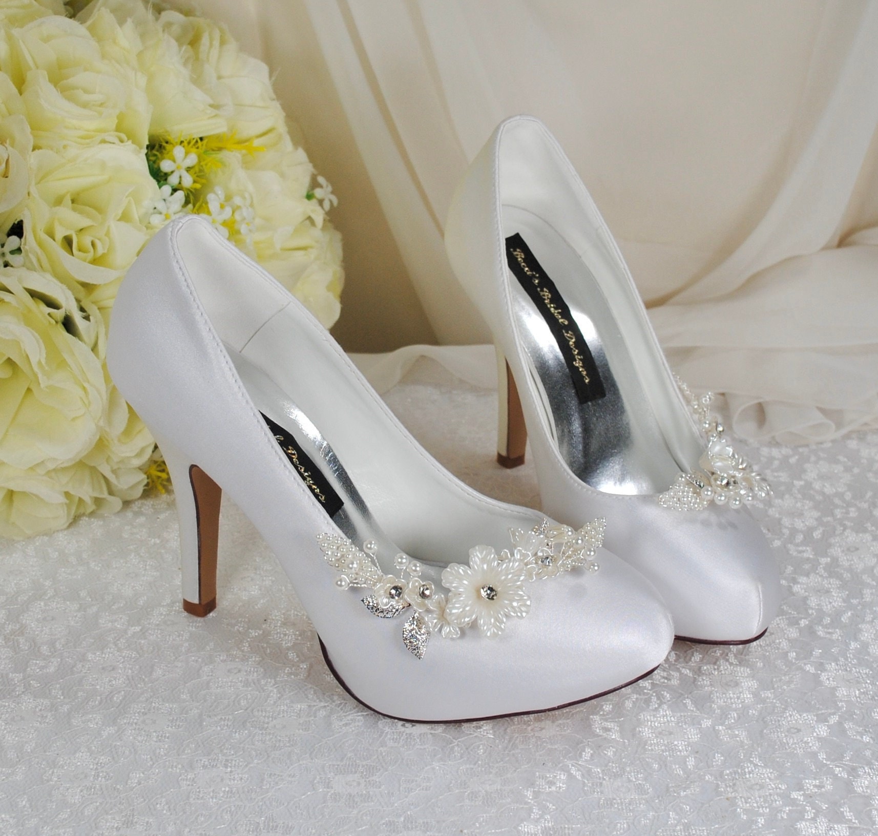 Illustrative example of white wedding shoes